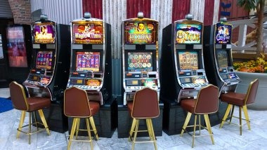 Mesin Arcade interface showing reel symbols and spin controls on gresiktoto platform